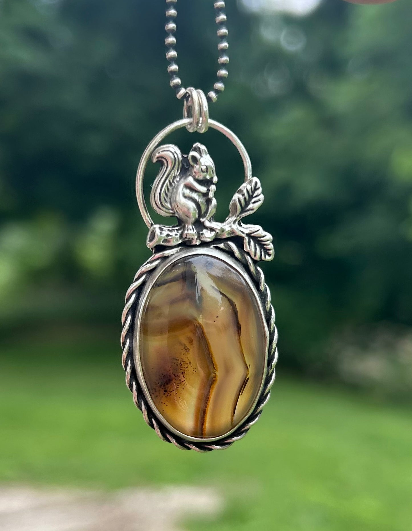 The Bentley Pendant Necklace, Montana Agate with Squirrel. Solid Sterling Silver, 18” Ball Chain